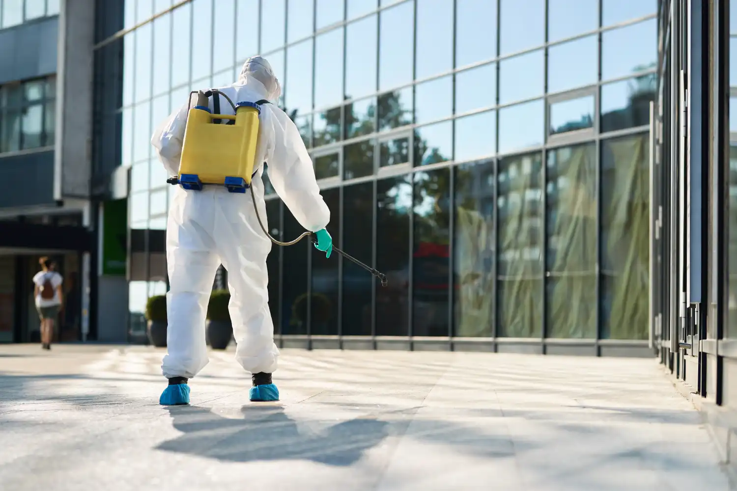 rear view of disinfection worker spraying city str 2026 01 06 10 26 20 utc