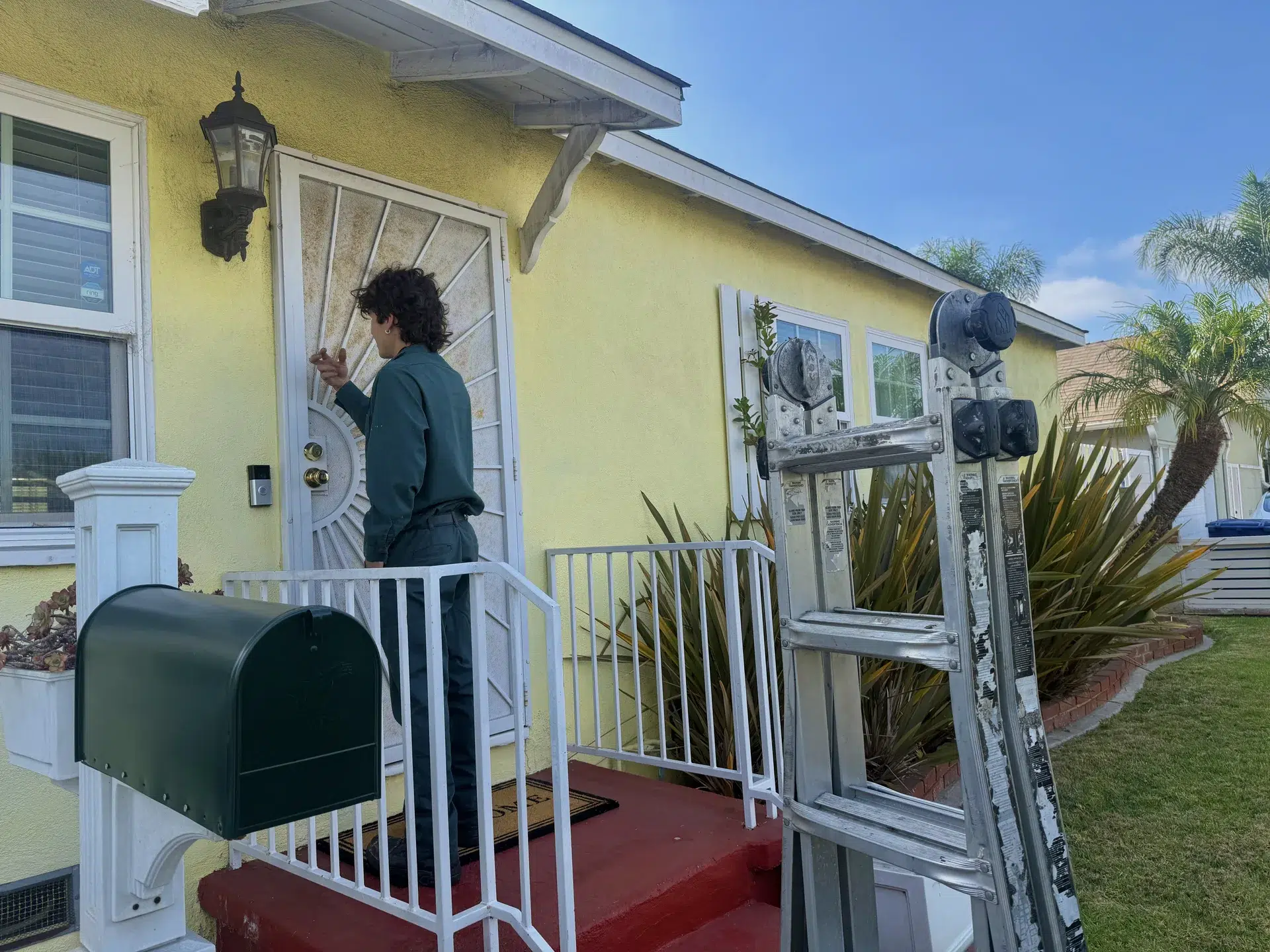 Fountain Valley termite technician treating a home