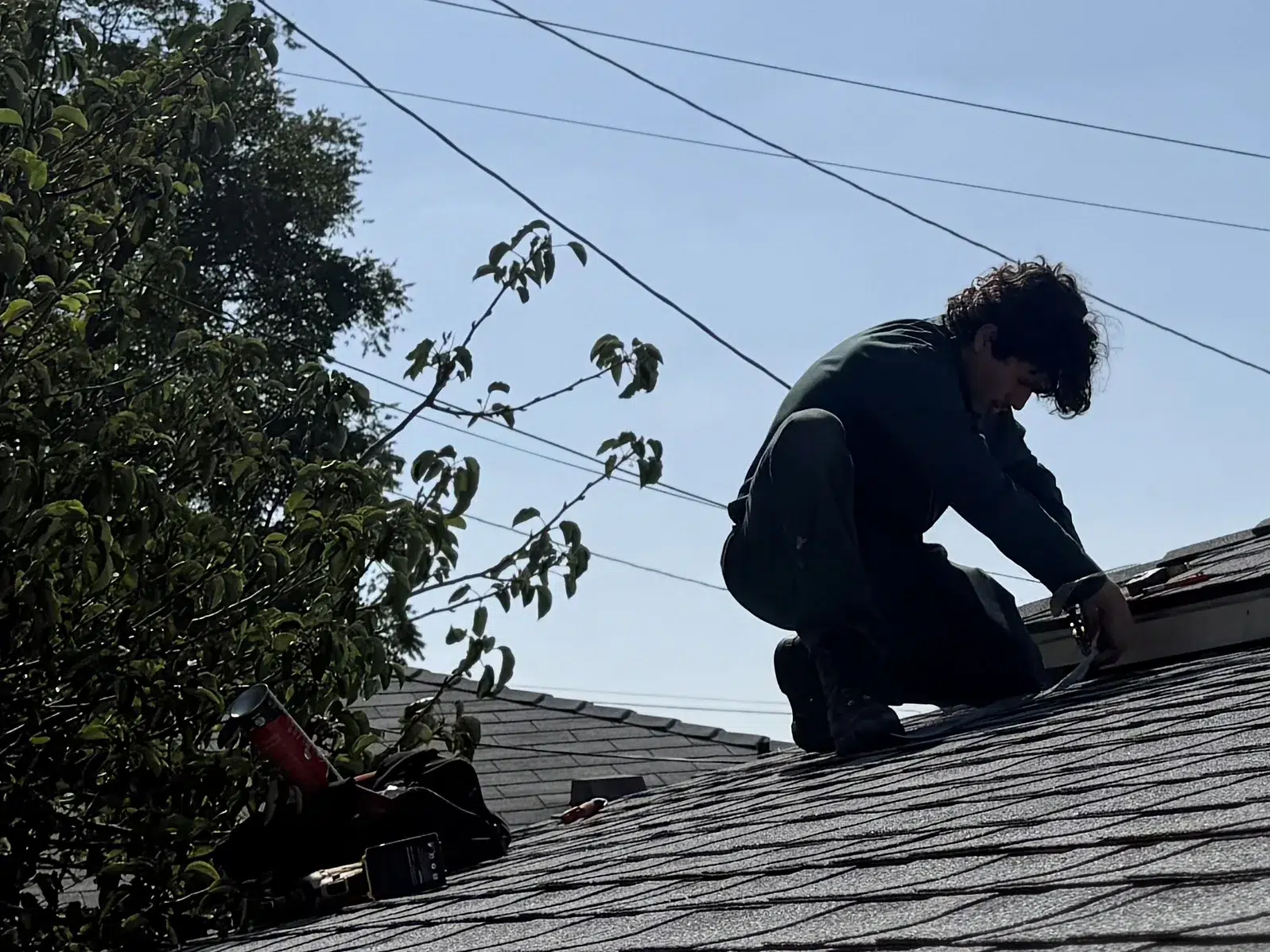 Treebark technician treating roof seams for termites in Huntington Beach CA