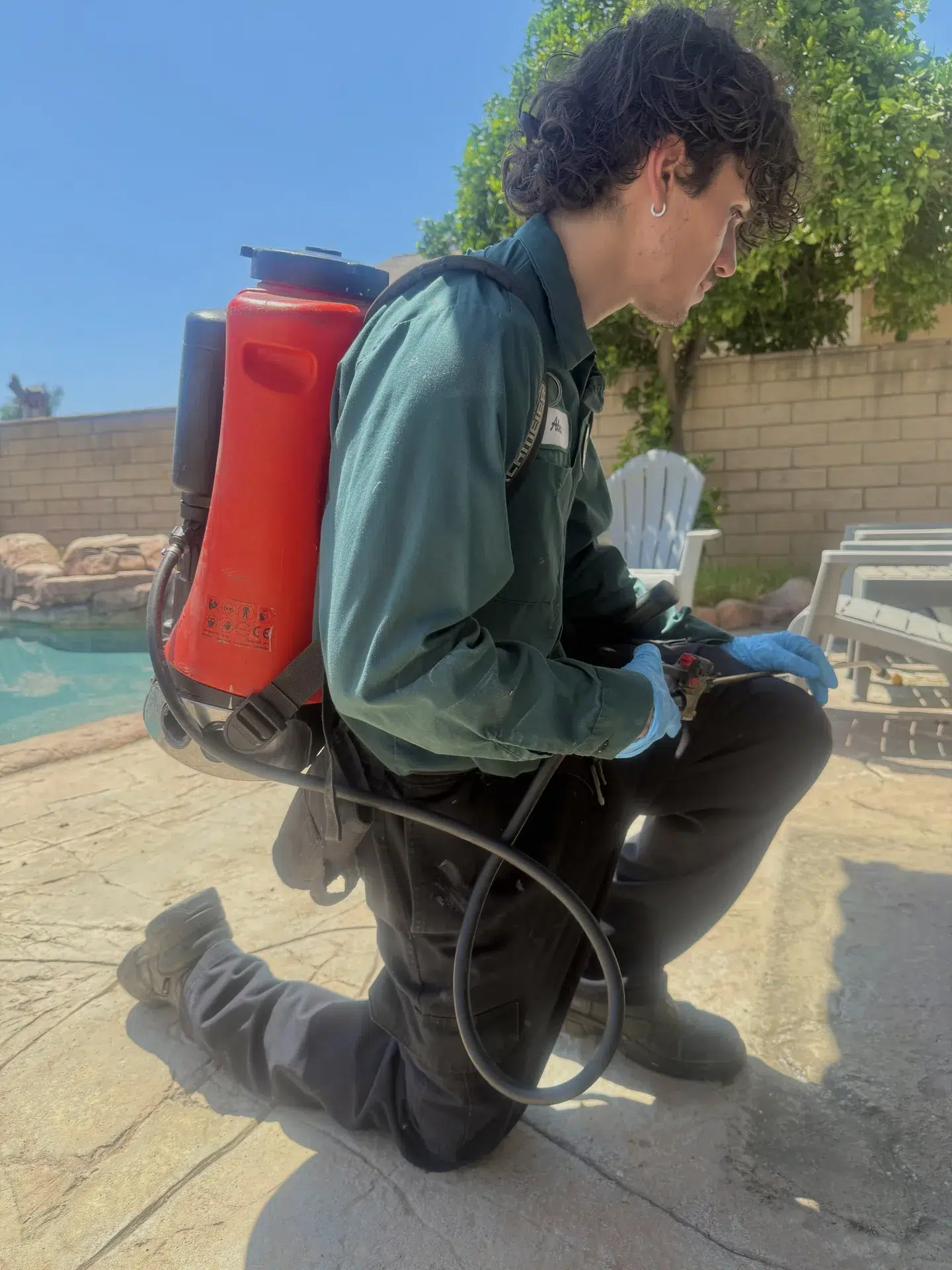 Treebark Kenzie technician working at an Arcadia CA home