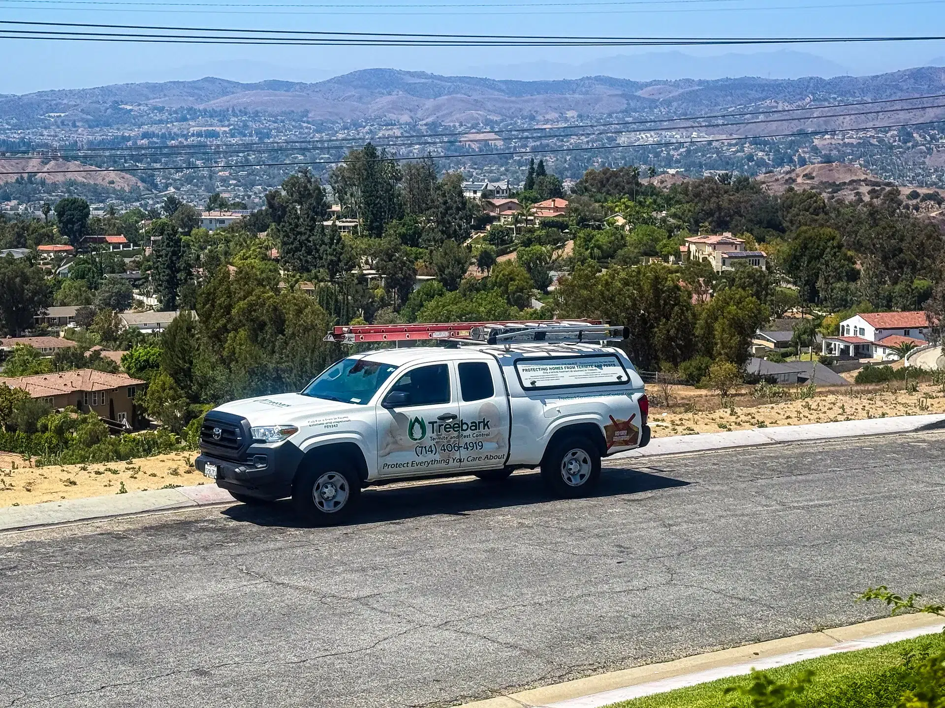 Dana Point pest control truck in the hills