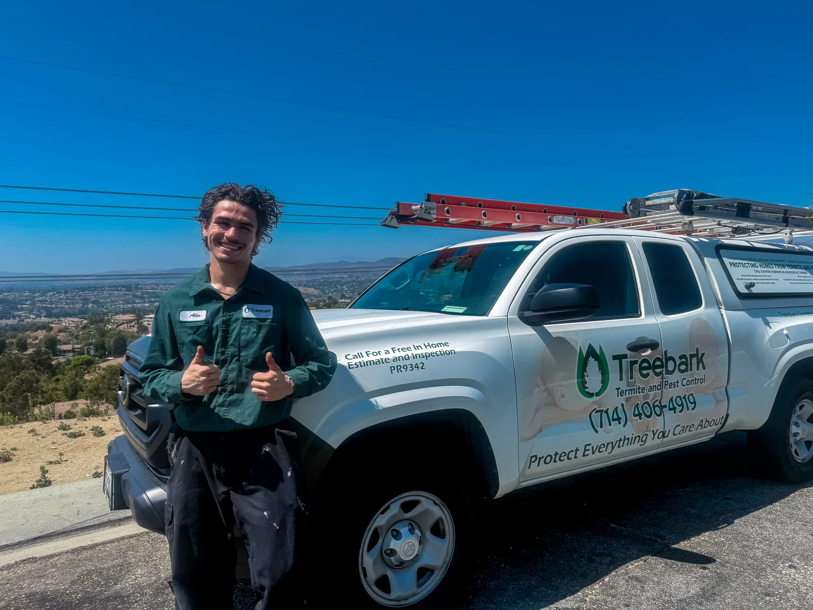 Treebark pest control truck and technician serving Dana Point